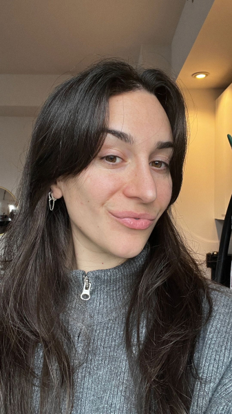 Image may contain Mina Orfanou Head Person Face Body Part Neck Dimples Adult Happy and Smile